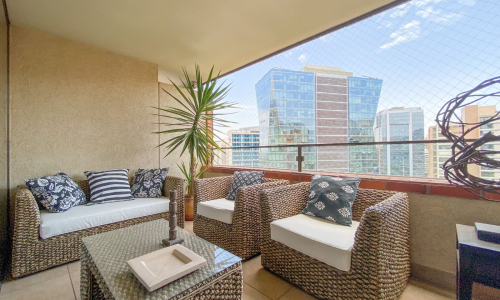 Living comedor amoblado en departamento de Balmoral 227, Las Condes.